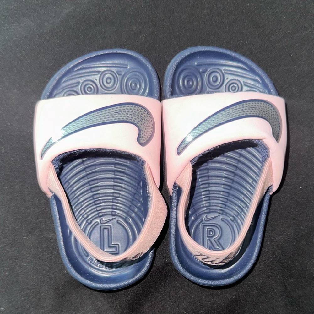 Nike baby girl pink and blue slides w/strap.
